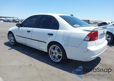 2001 Honda Civic Dx z USA, uszkodzony, nr VIN 1HGES152X1L063818